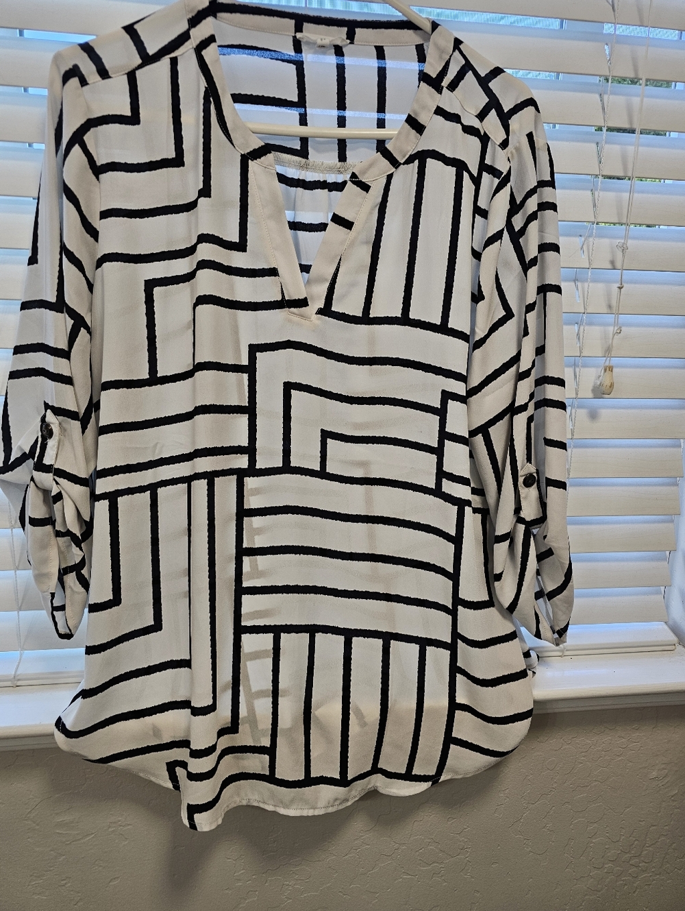 Maurices women’s Black & White Geometric Roll-Sleeve Blouse
